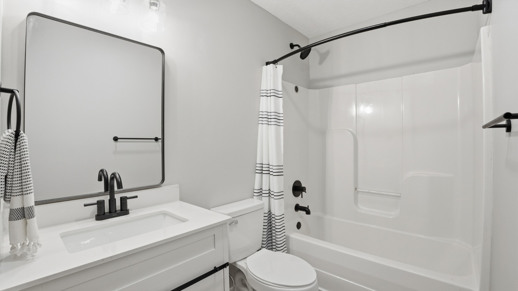 790 Preston Ridge Road Mulberry, TN 37359 - Photo 18 of 44 a bathroom with a sink toilet a mirror and shower