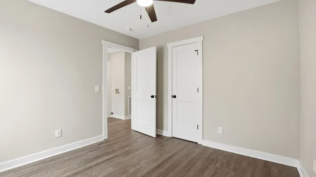 a kitchen with stainless steel appliances a refrigerator sink and microwave