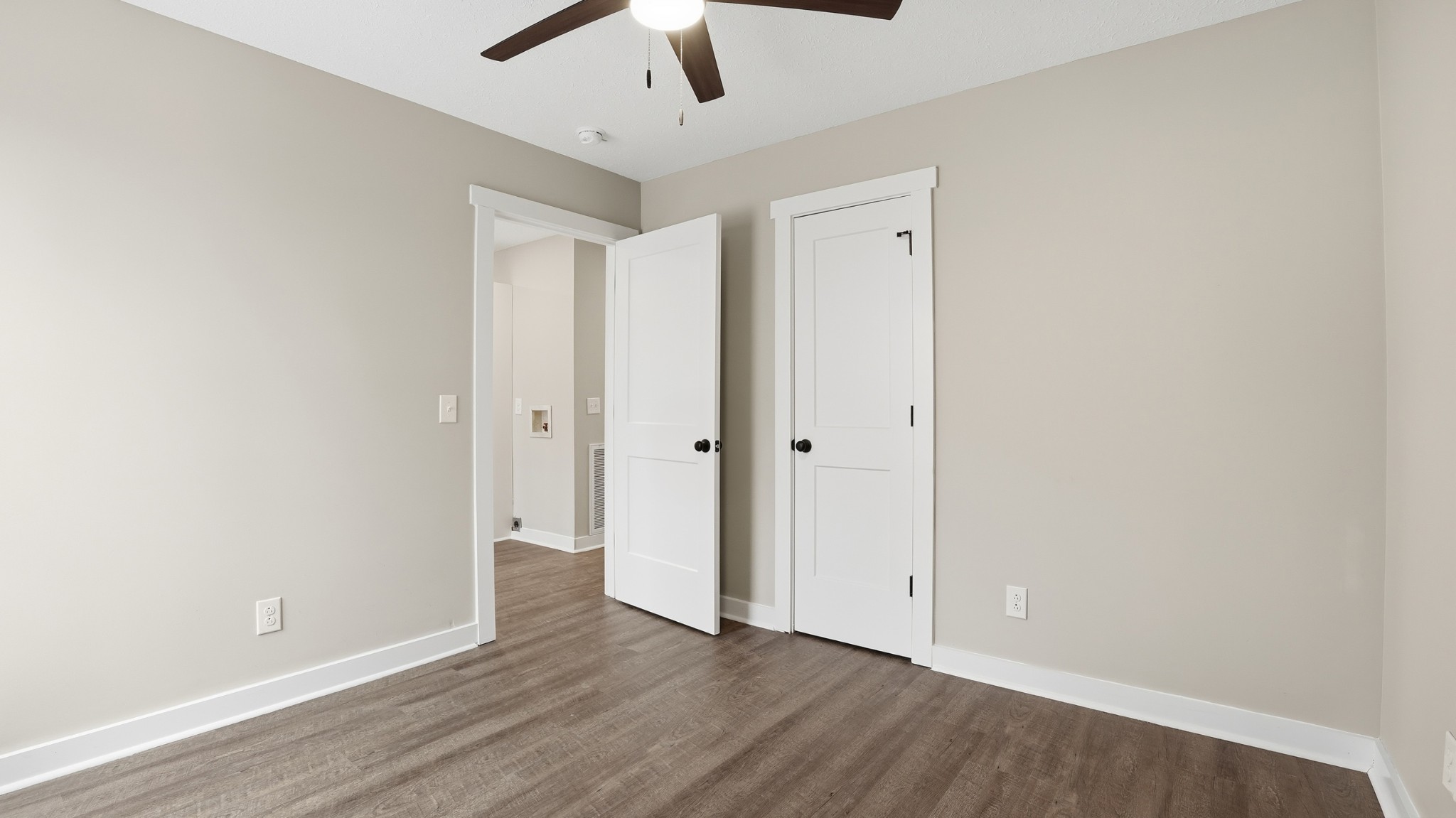 790 Preston Ridge Road Mulberry, TN 37359 - Photo 22 of 44 an empty room with wooden floor and windows