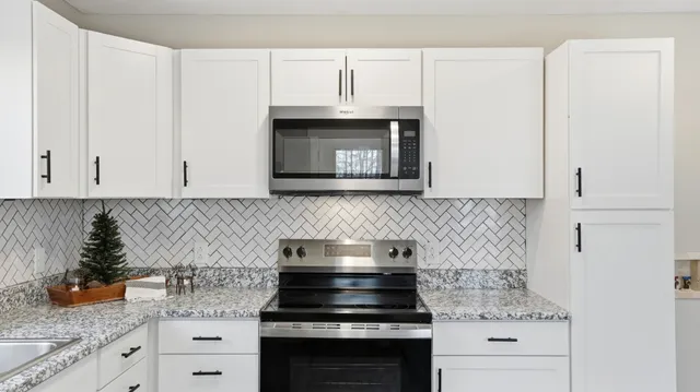 a front view of a house with wooden stairs