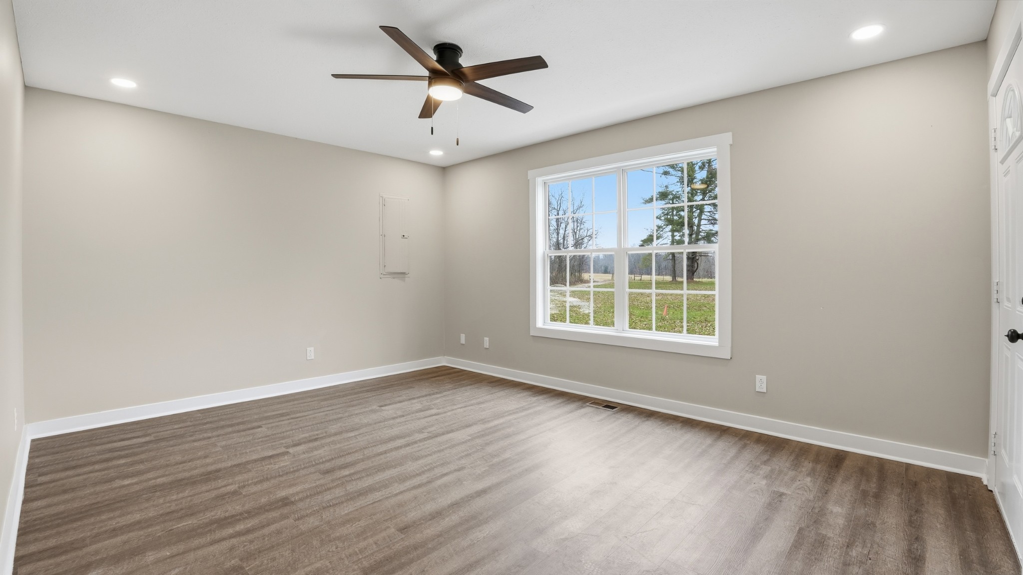 790 Preston Ridge Road Mulberry, TN 37359 - Photo 8 of 44 wooden floor in an empty room with a window