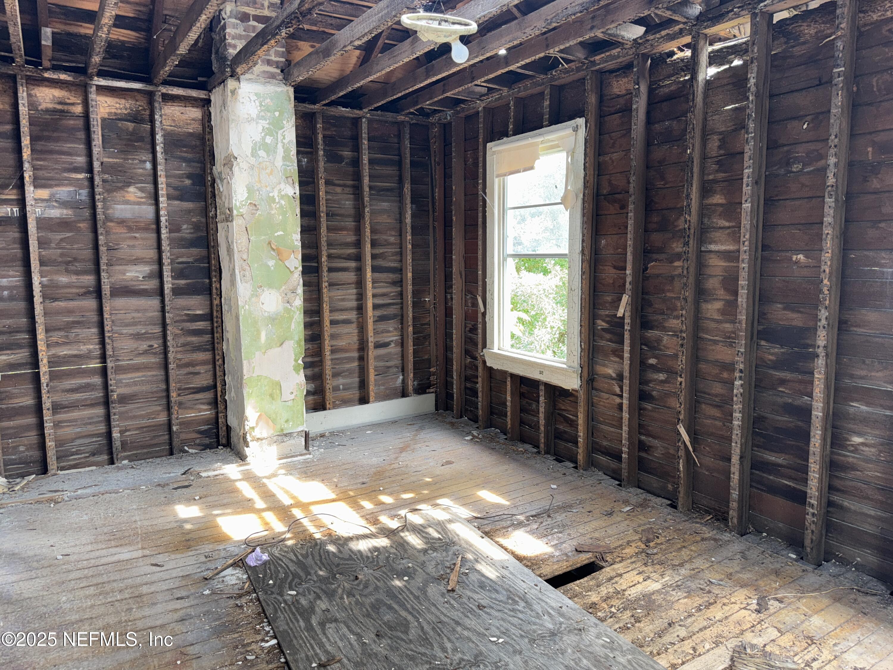 95 Oneida Street St. Augustine, FL 32084 - Photo 11 of 15 a view of empty room with windows
