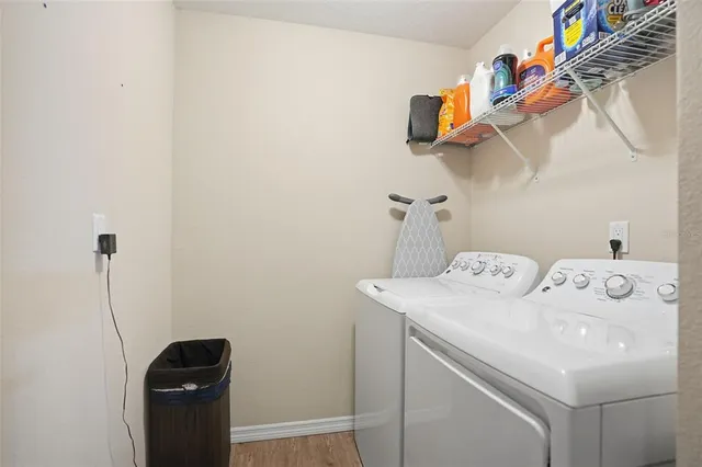 a utility room with dryer and washer
