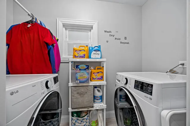 a utility room with dryer and washer