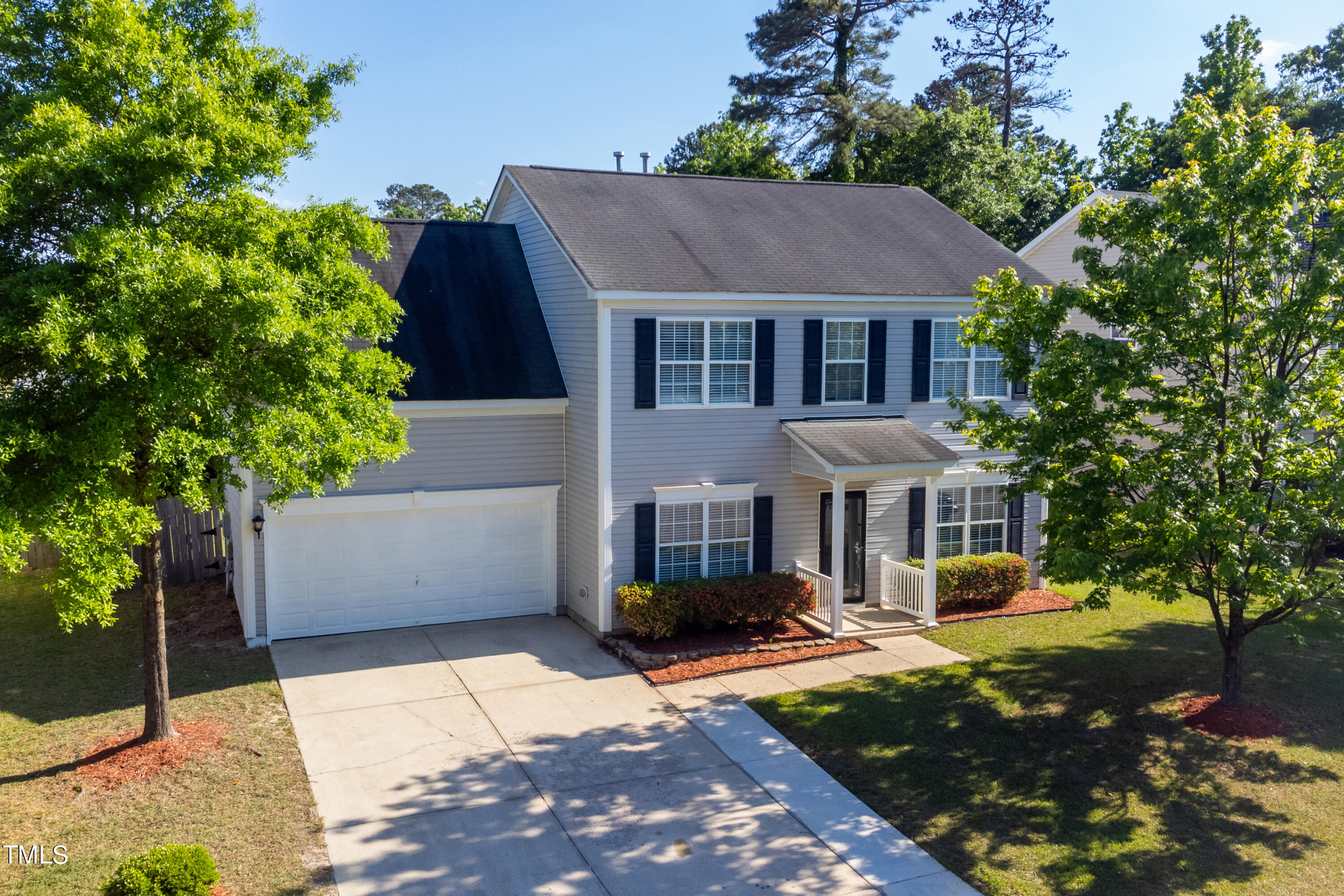 5308 Neuse Forest Road Raleigh, NC 27616 - Photo 1 of 26 front view of a house with a yard