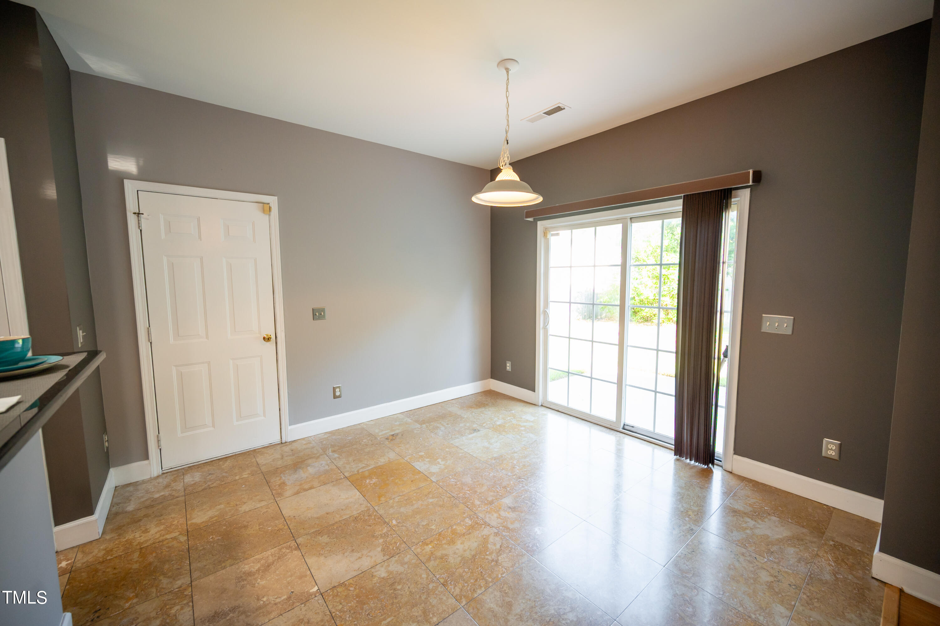 5308 Neuse Forest Road Raleigh, NC 27616 - Photo 11 of 26 a view of an empty room with a window
