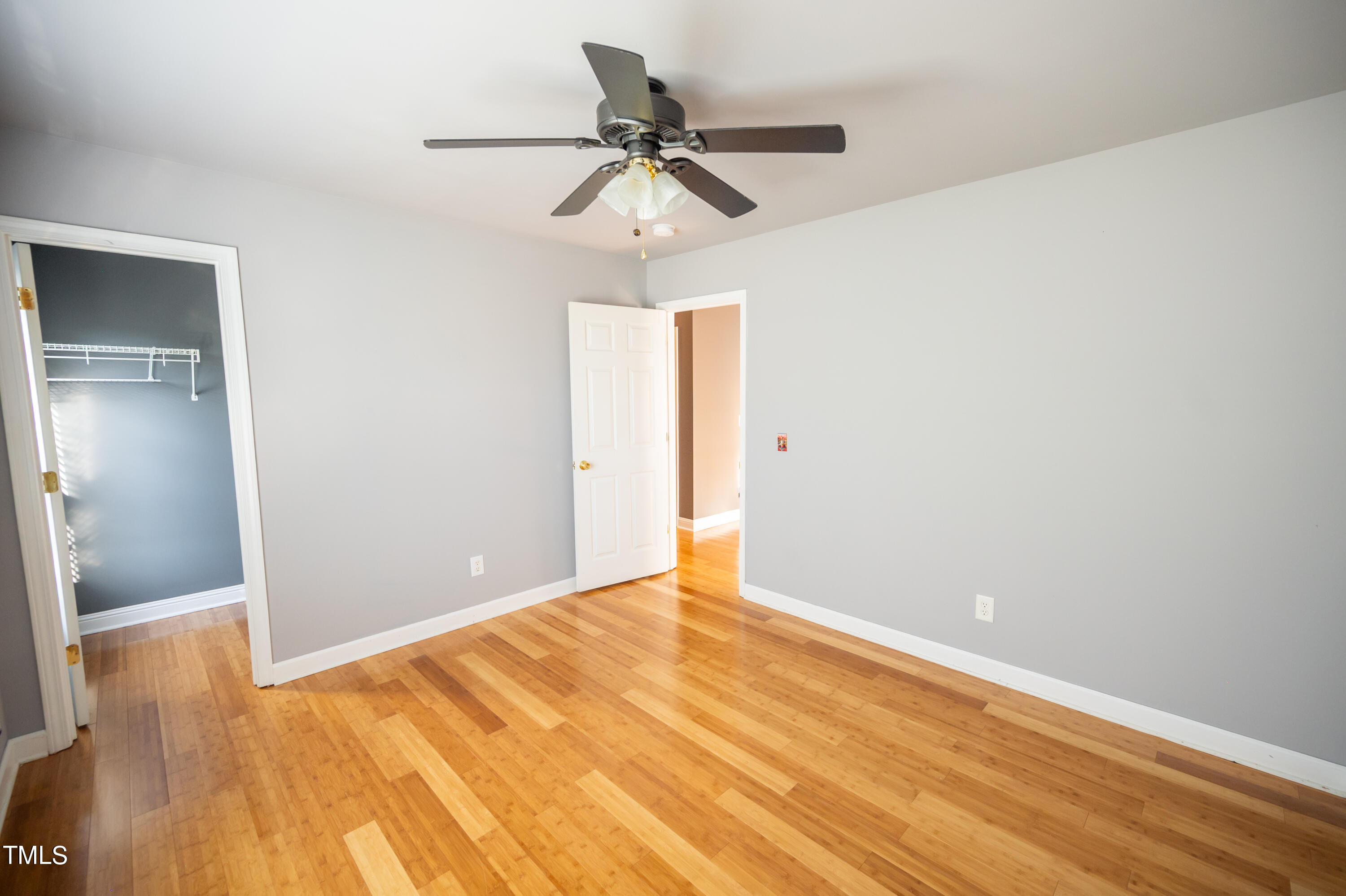 5308 Neuse Forest Road Raleigh, NC 27616 - Photo 19 of 26 a view of empty room with wooden floor