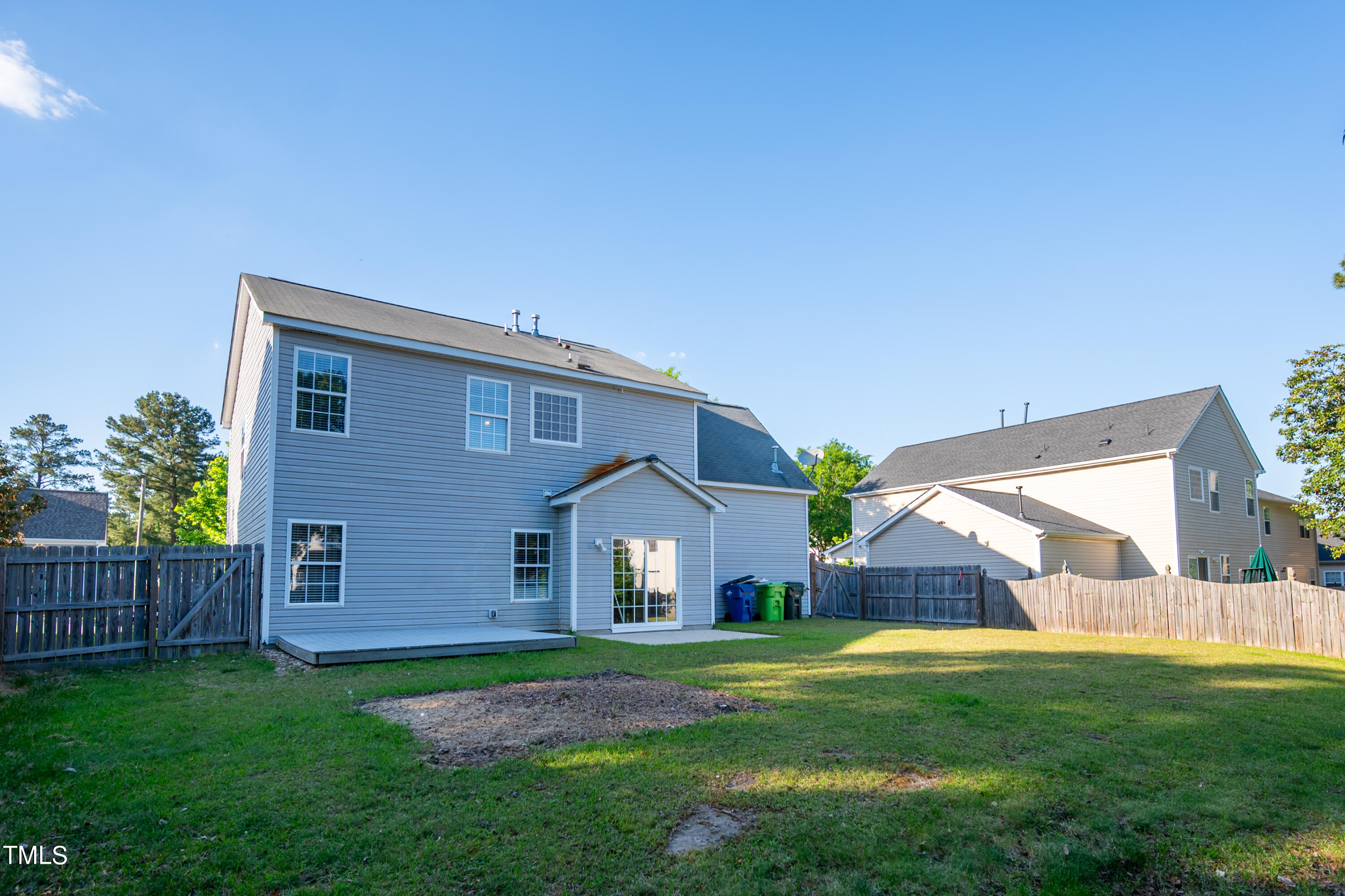 5308 Neuse Forest Road Raleigh, NC 27616 - Photo 23 of 26 a view of house with backyard