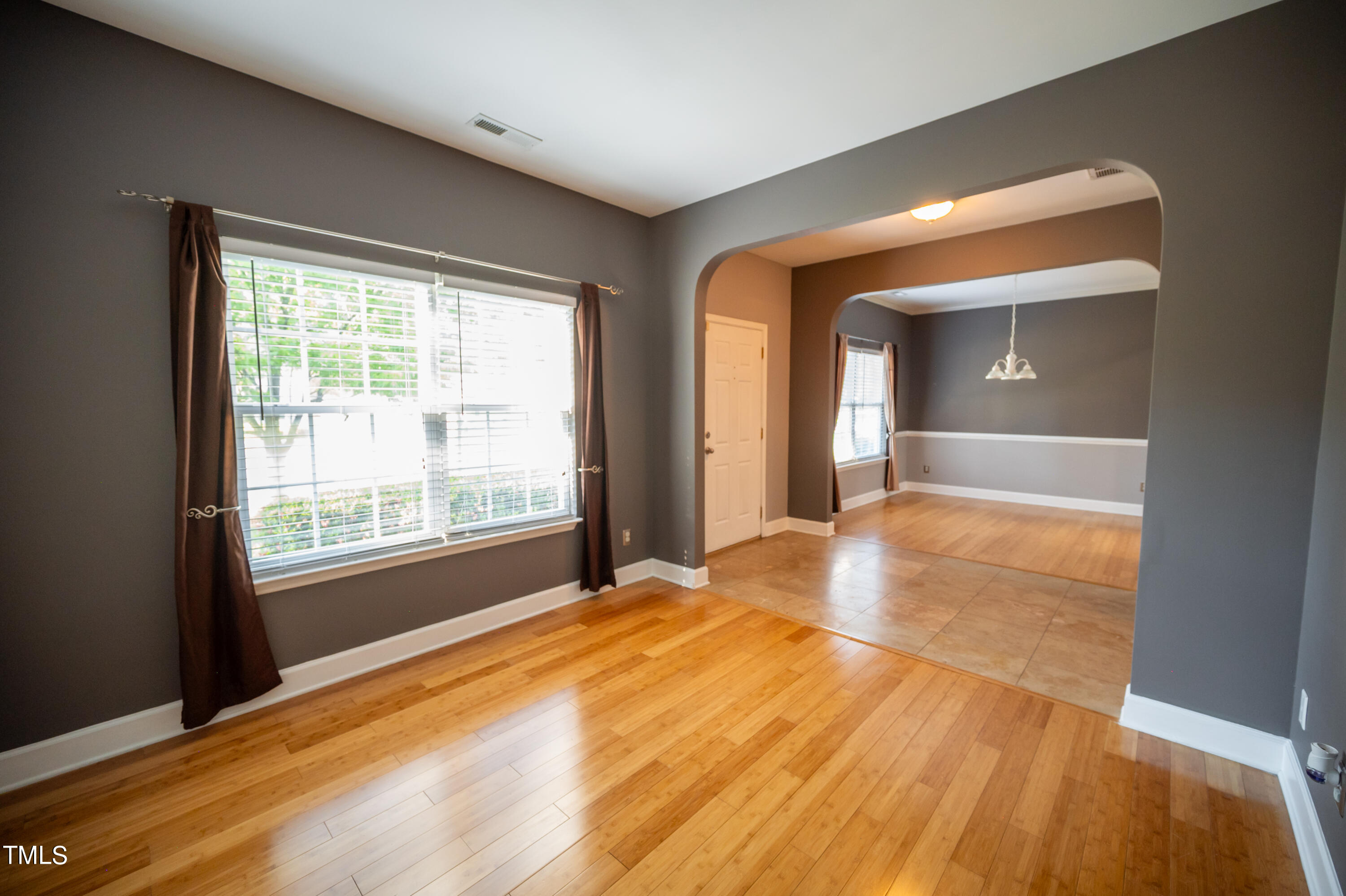 5308 Neuse Forest Road Raleigh, NC 27616 - Photo 4 of 26 a bedroom with a bed and a window