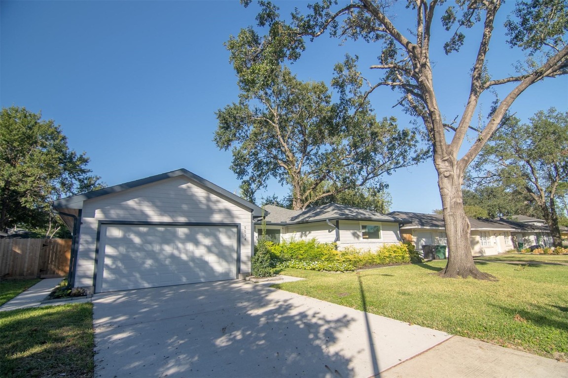 Fully renovated home nestled in a quaint neighborhood with four bedrooms and three full bathrooms