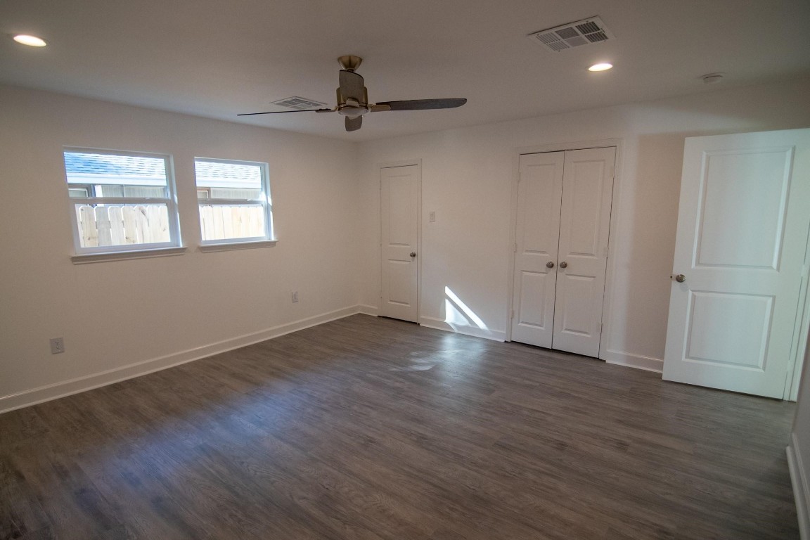 5534 Pagewood Lane Houston, TX 77056 - Photo 4 of 12 Master bedroom with a large walk-in closet and bathroom with double sinks and walk-in shower