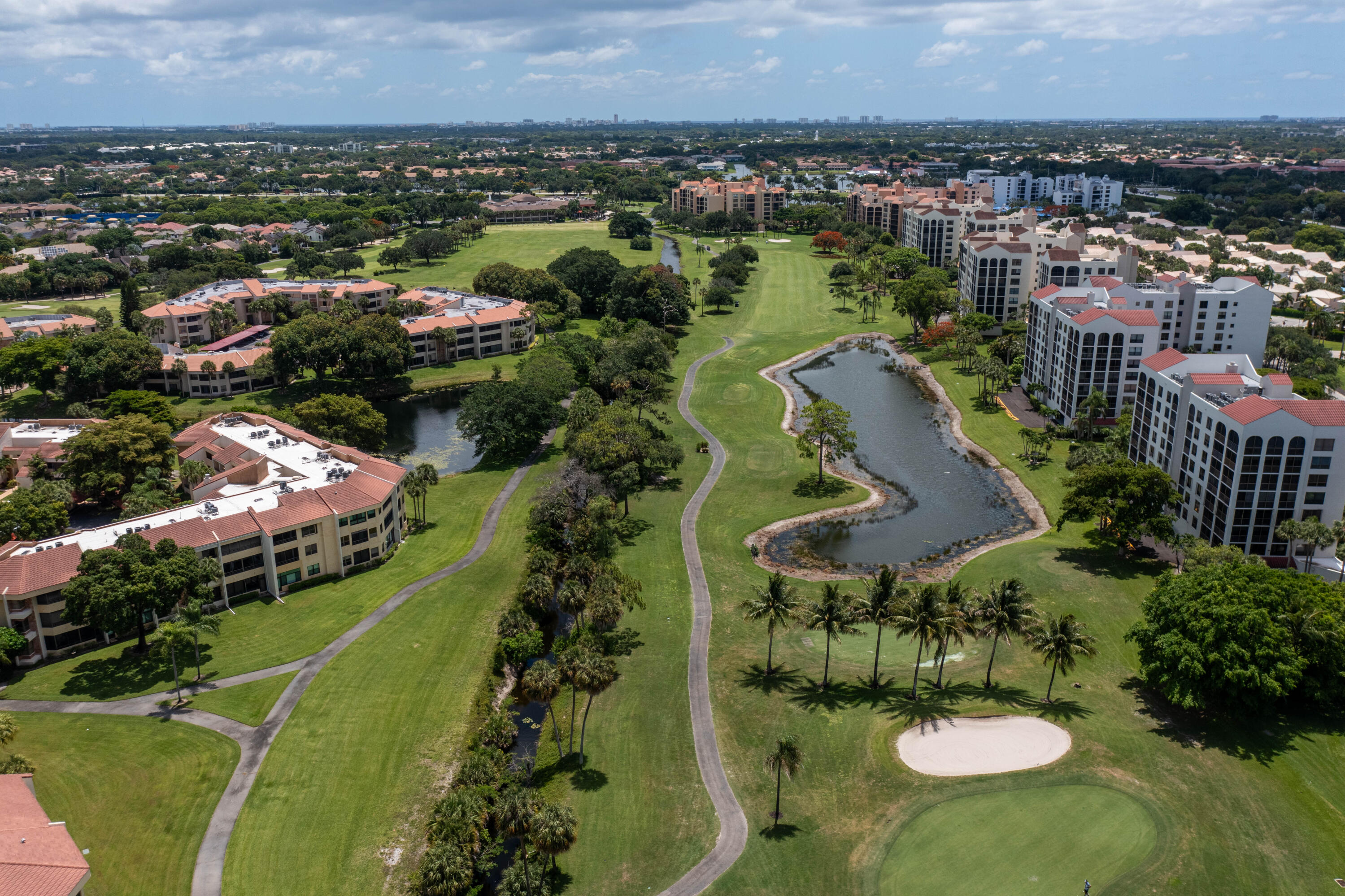 7520 La Paz Boulevard, Unit 104 Boca Raton, FL 33433 - Photo 6 of 56 an aerial view of multiple house