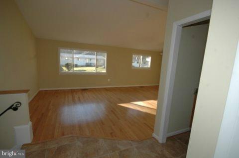 7405 Kathydale Road Pikesville, MD 21208 - Photo 4 of 29 a view of empty room with window