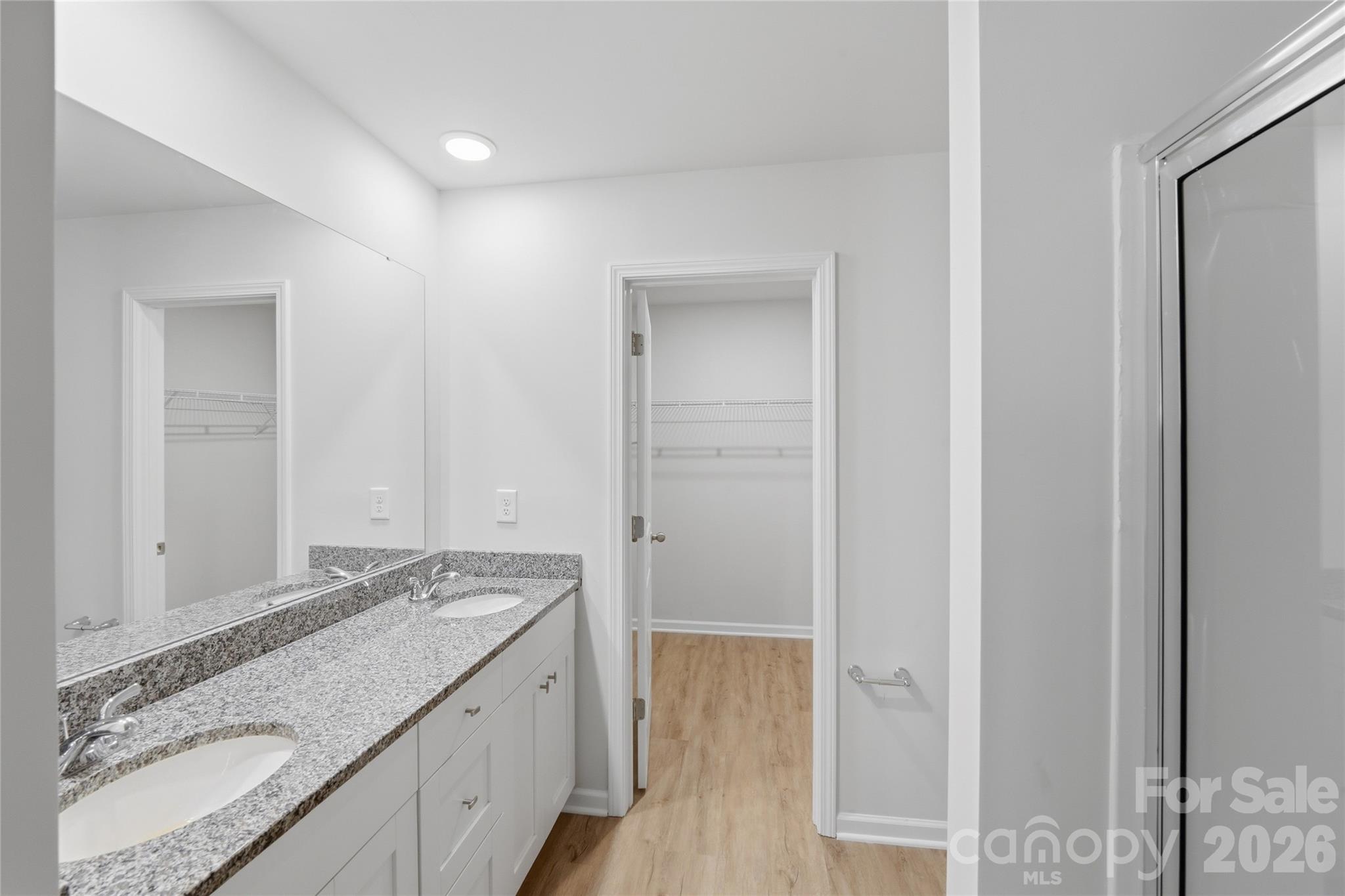 242 Landers Chapel Road Lincolnton, NC 28092 - Photo 28 of 33 a bathroom with a granite countertop sink and a mirror