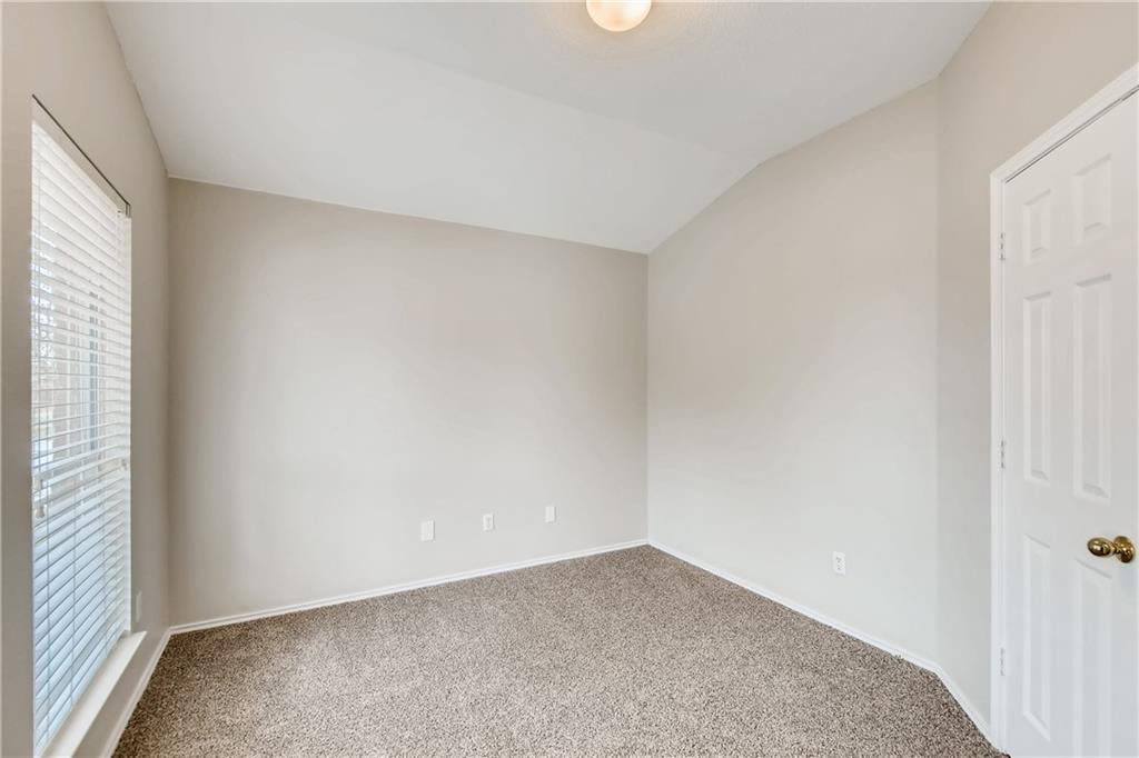 229 Killian Loop Hutto, TX 78634 - Photo 16 of 28 a view of an empty room and a window