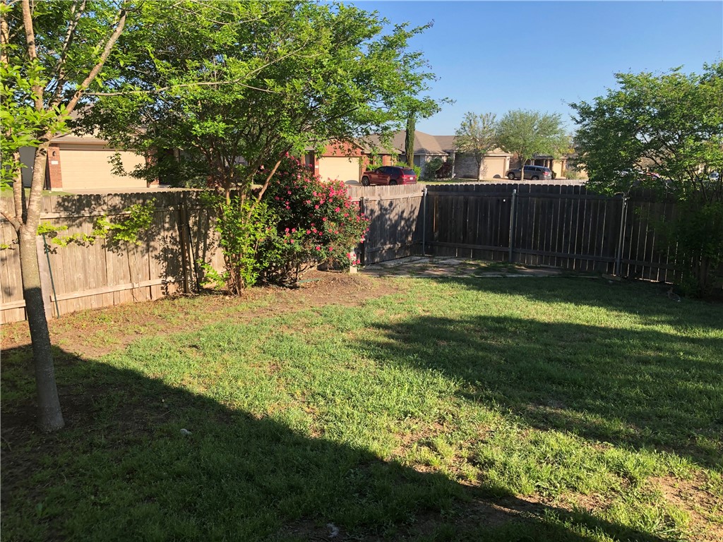 229 Killian Loop Hutto, TX 78634 - Photo 23 of 28 a view of swimming pool with an outdoor space and seating area