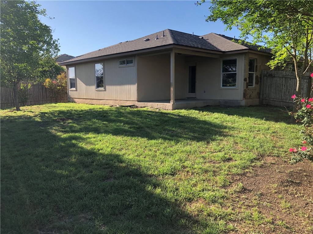 229 Killian Loop Hutto, TX 78634 - Photo 24 of 28 a view of a house with a yard