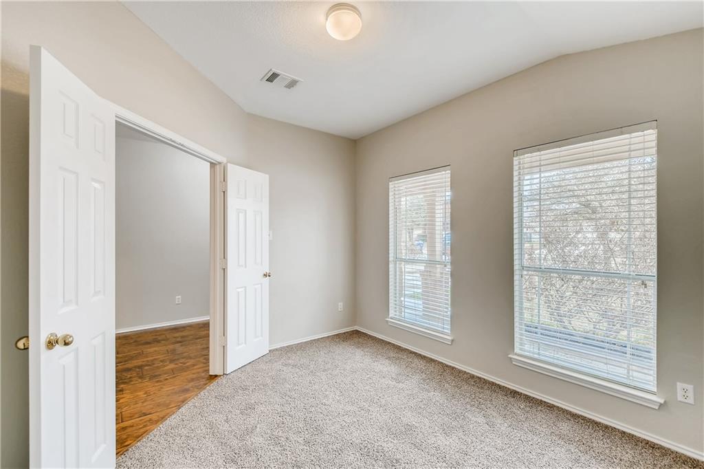 229 Killian Loop Hutto, TX 78634 - Photo 5 of 28 a view of livingroom with hardwood floor and window
