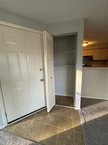 a view of a balcony with wooden floor