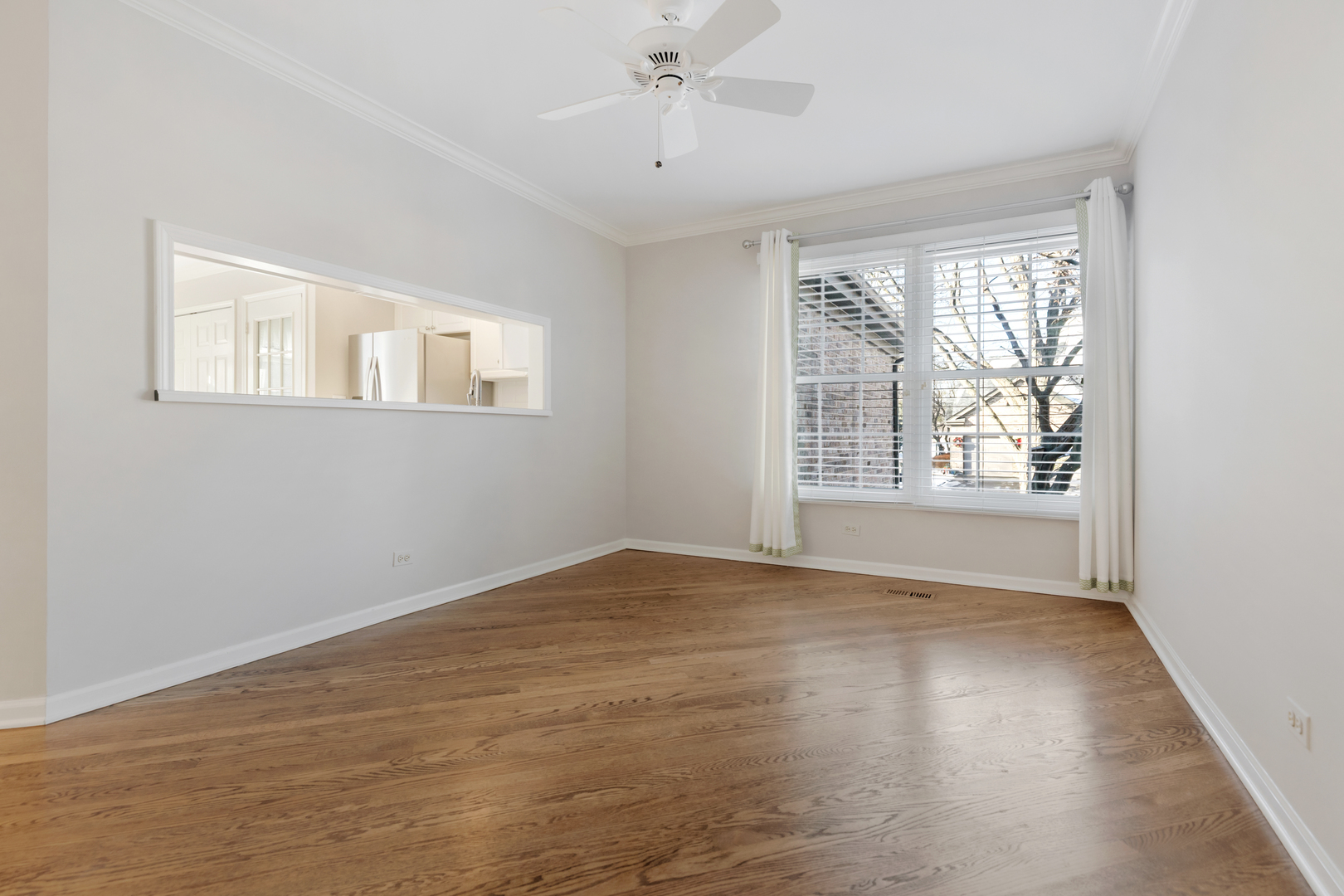 14707 Hollow Tree Road Orland Park, IL 60462 - Photo 19 of 47 a view of an empty room with a window