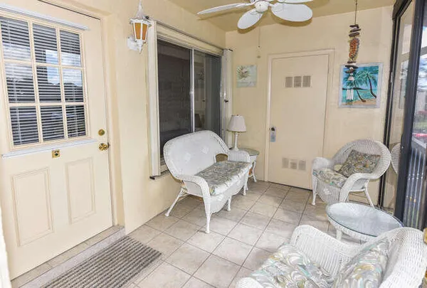 a room with furniture and a window