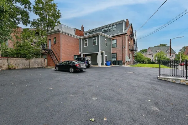 a car parked in front of a house