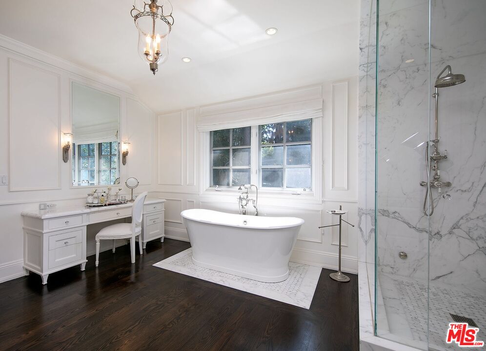 655 North Faring Road Los Angeles, CA 90077 - Photo 22 of 26 a bathroom with a sink and mirror