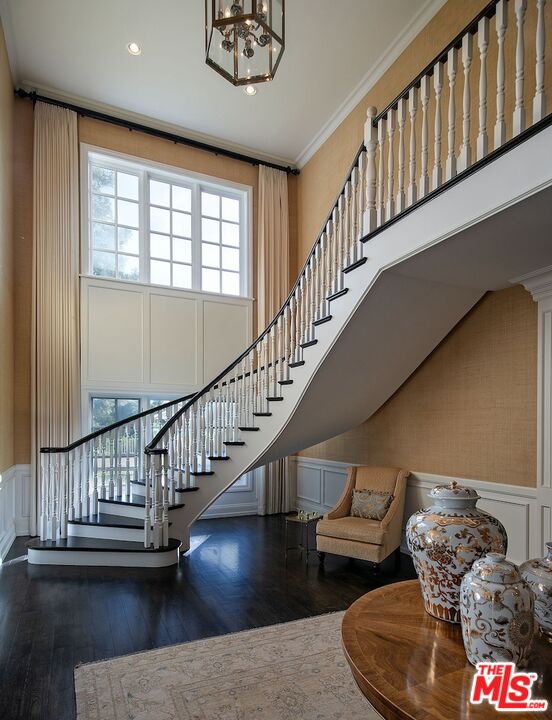 655 North Faring Road Los Angeles, CA 90077 - Photo 8 of 26 a view of entryway and hall with wooden floor