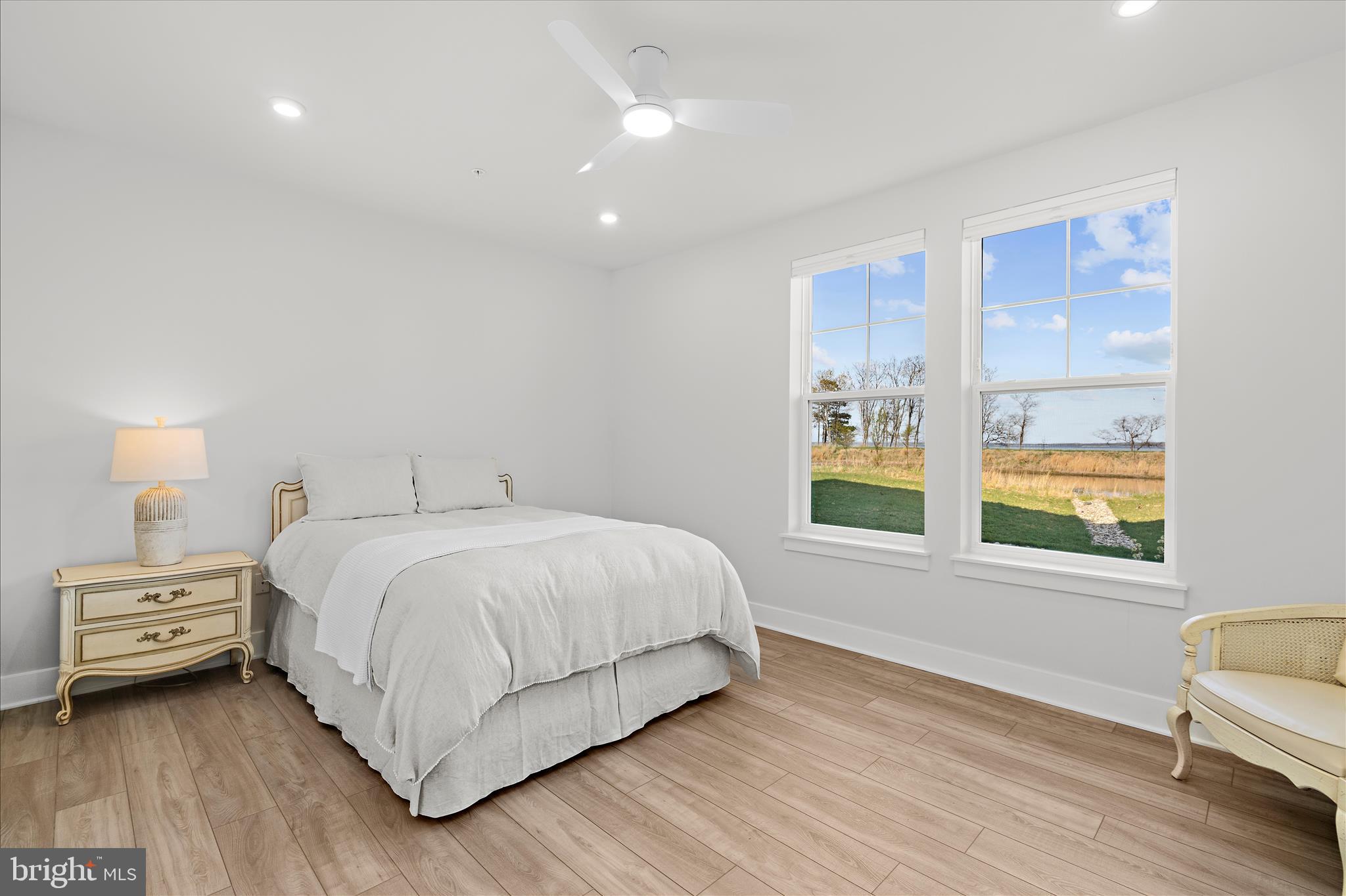 132 Wheelhouse Way, Unit 11 Chester, MD 21619 - Photo 21 of 77 a bedroom with a bed and a window