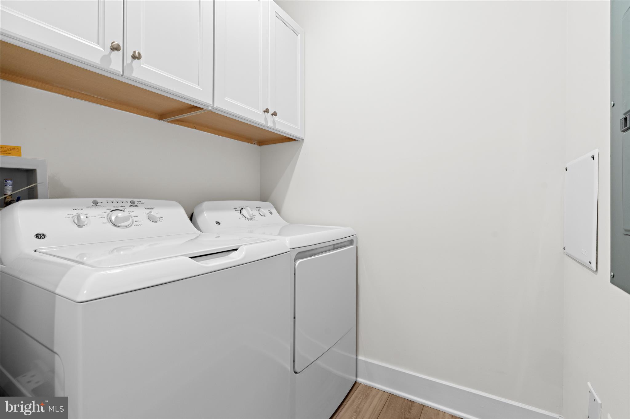 132 Wheelhouse Way, Unit 11 Chester, MD 21619 - Photo 25 of 77 a utility room with dryer and washer