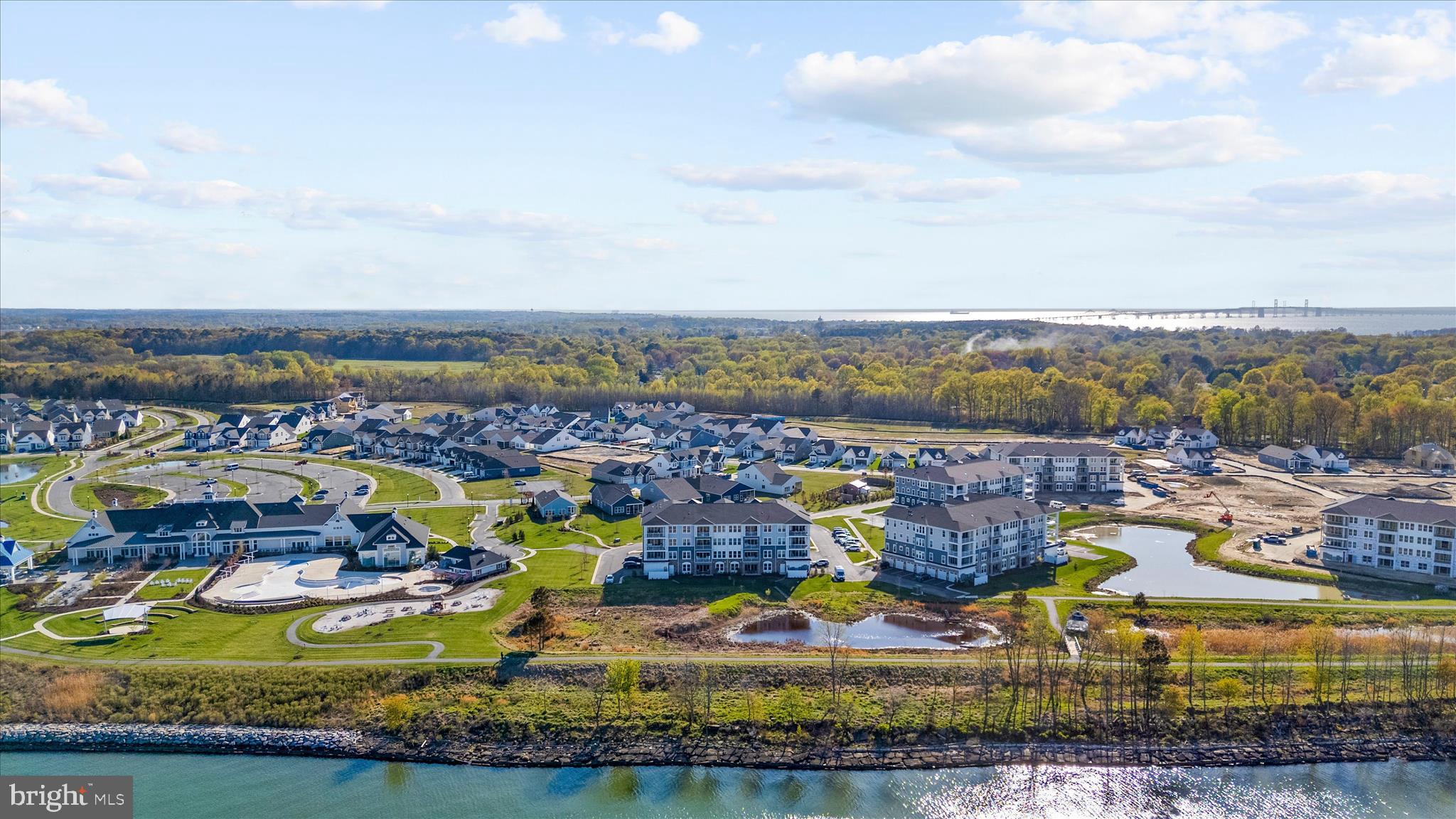 132 Wheelhouse Way, Unit 11 Chester, MD 21619 - Photo 42 of 77 a view of a city with lawn chairs