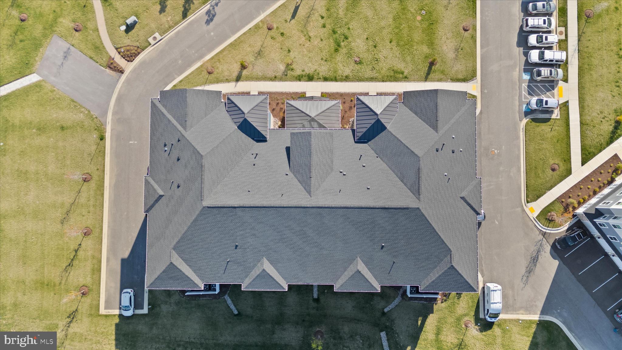 132 Wheelhouse Way, Unit 11 Chester, MD 21619 - Photo 43 of 77 an aerial view of a house with a swimming pool