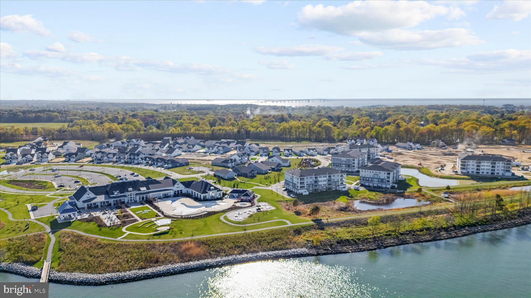 132 Wheelhouse Way, Unit 11 Chester, MD 21619 - Photo 45 of 77 an aerial view of residential houses with outdoor space