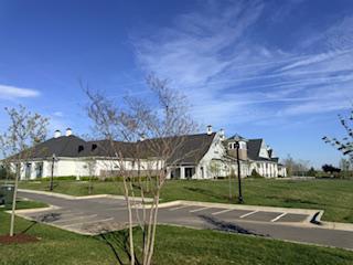 132 Wheelhouse Way, Unit 11 Chester, MD 21619 - Photo 56 of 77 a view of a house with a yard