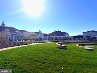 132 Wheelhouse Way, Unit 11 Chester, MD 21619 - Photo 58 of 77 Sunny serenity in lush green grounds.