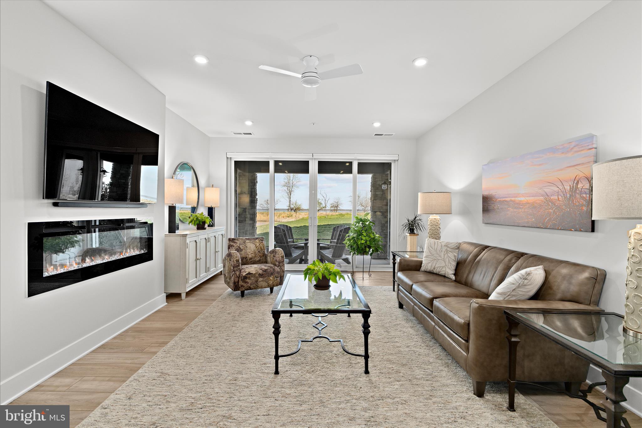 132 Wheelhouse Way, Unit 11 Chester, MD 21619 - Photo 8 of 77 a living room with furniture and a flat screen tv