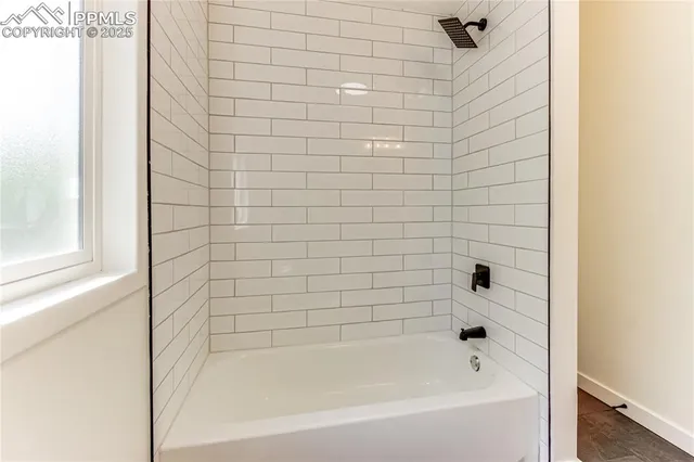 a bathroom with a bathtub