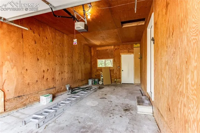 a view of a bathroom with a sink and a window