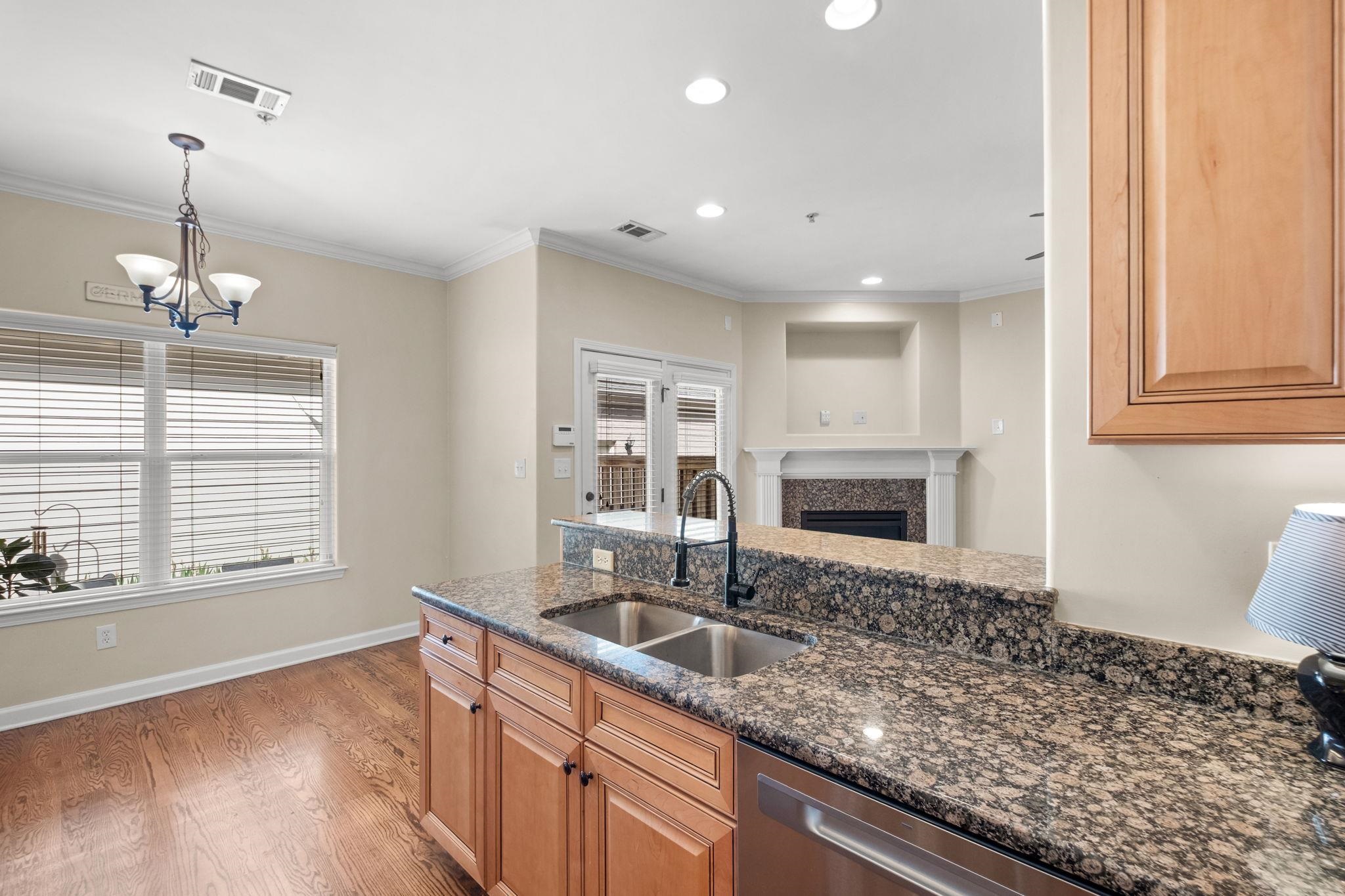 2275 McVay Road, Unit 2275 Germantown, TN 38138 - Photo 8 of 40 a kitchen with a sink stove and cabinets