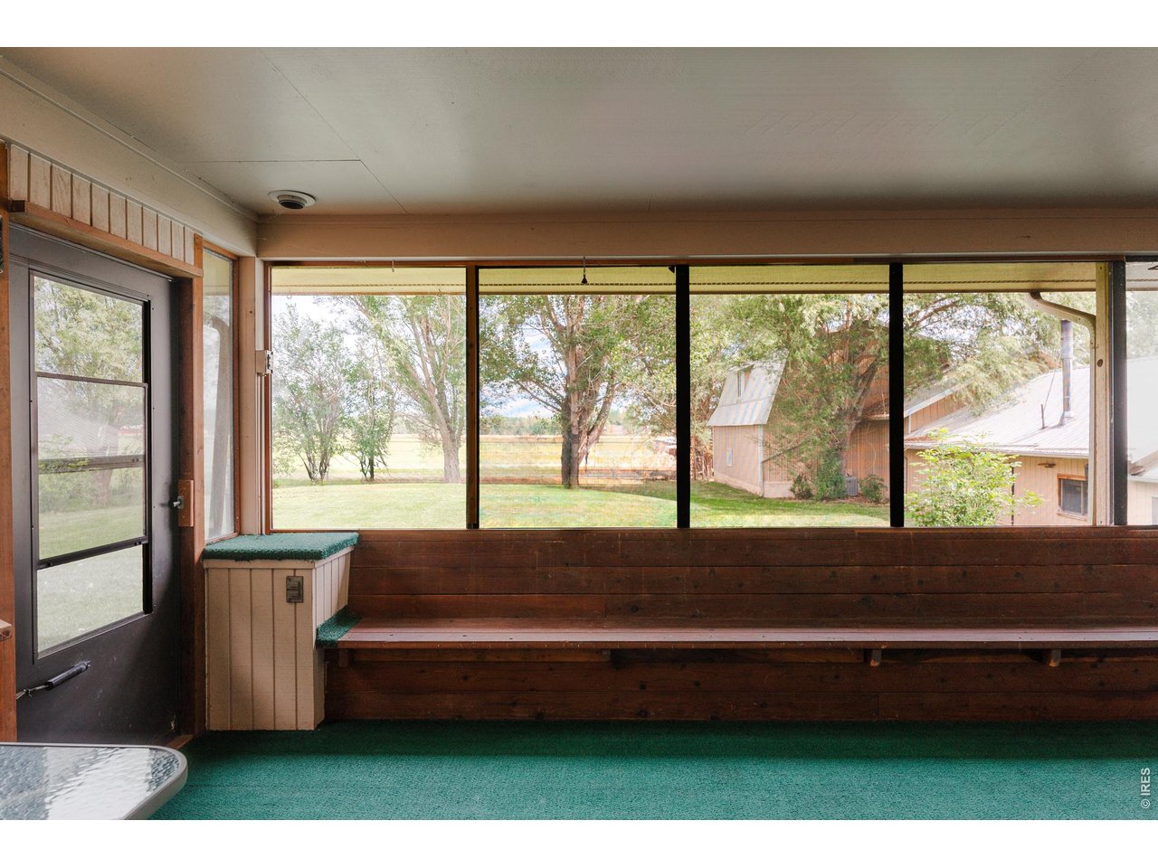 6789 Niwot Road Longmont, CO 80503 - Photo 16 of 28 Enclosed porch.