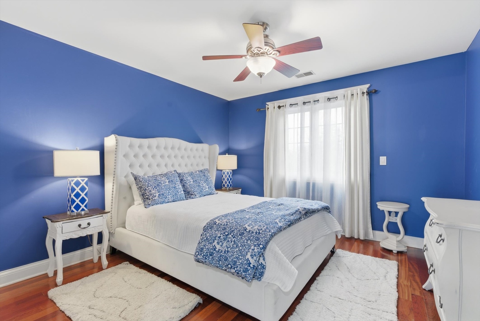 395 Scott Street Elmhurst, IL 60126 - Photo 21 of 46 a bedroom with a bed and a chandelier