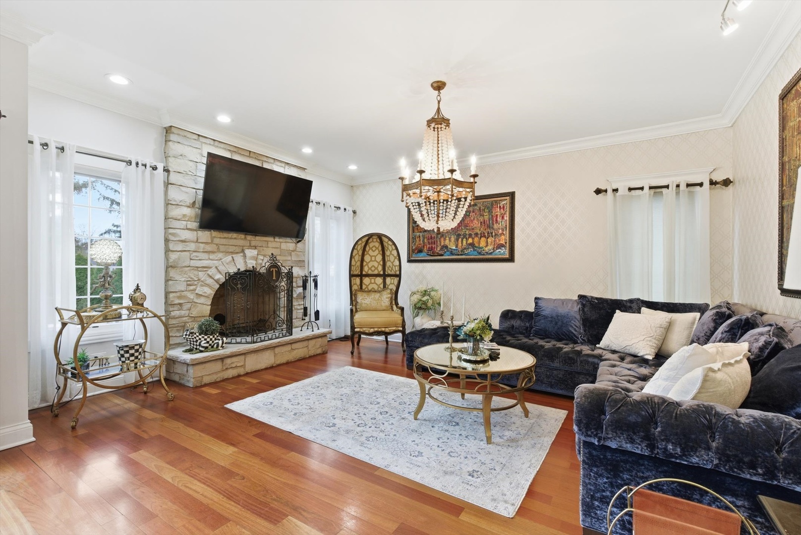 395 Scott Street Elmhurst, IL 60126 - Photo 3 of 46 a living room with furniture a fireplace and a flat screen tv