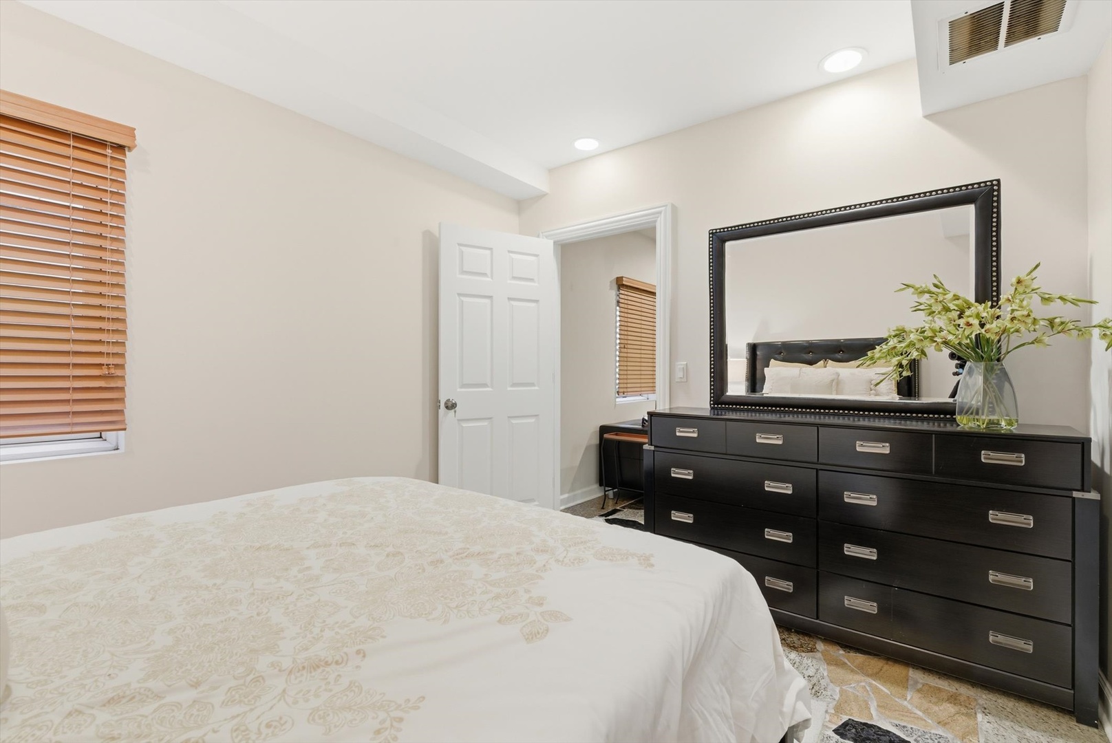 395 Scott Street Elmhurst, IL 60126 - Photo 32 of 46 a bedroom with a bed and a dresser