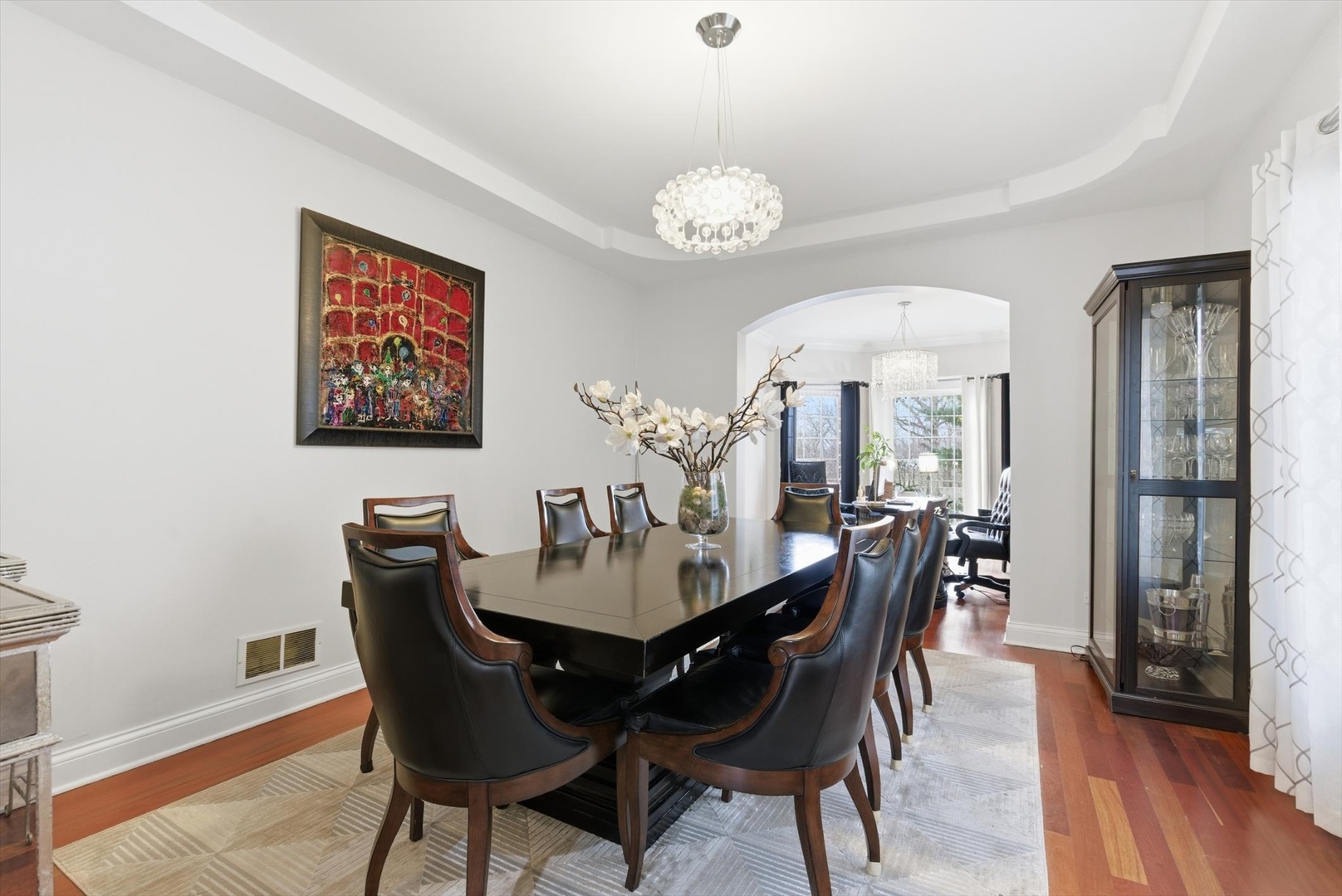 395 Scott Street Elmhurst, IL 60126 - Photo 8 of 46 a view of a dining room with furniture wooden floor and chandelier