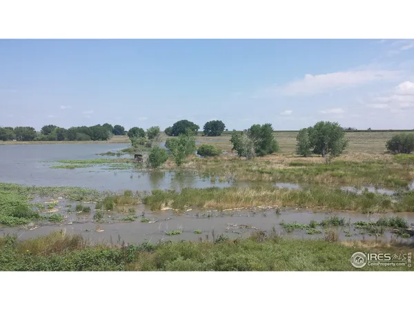 a open area with lake view and mountain view