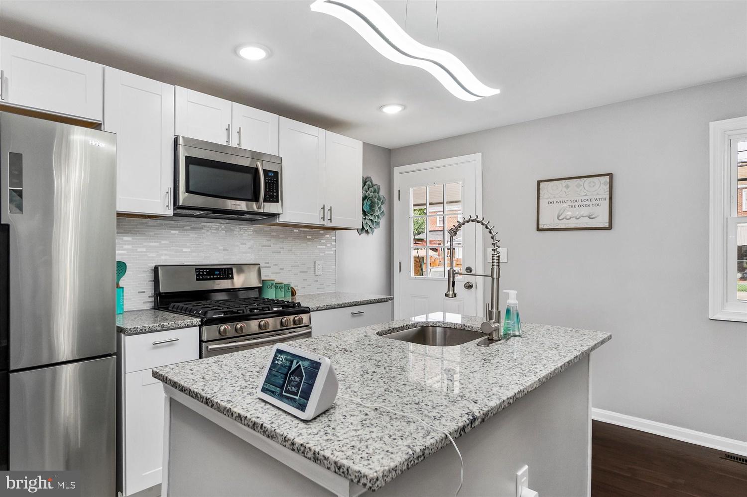 8164 North Boundary Road Baltimore, MD 21222 - Photo 11 of 31 Above stove microwave