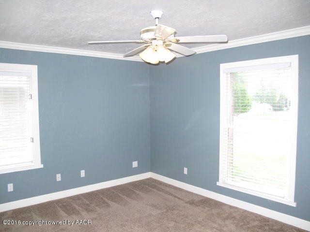 6306 Jameson Road Amarillo, TX 79106 - Photo 28 of 32 a view of a chandelier fan and fire place