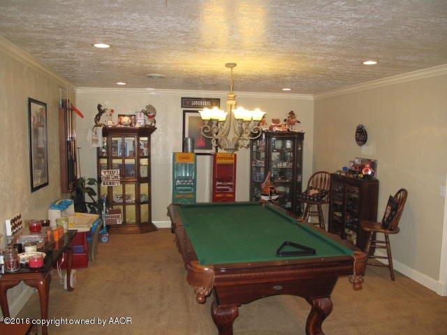 6306 Jameson Road Amarillo, TX 79106 - Photo 9 of 32 a room with musical instruments