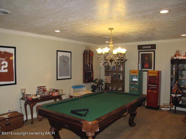 6306 Jameson Road Amarillo, TX 79106 - Photo 10 of 32 a room with pool table and windows