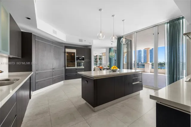 a bath tub sitting next to a bathroom sink
